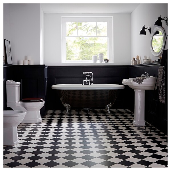 PLANETE BAIN - Baignoire îlot Charly noire avec pieds patte d'aigle chrome - large