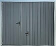 SPADONE - Porte de garage basculante grise avec portillon l.240 x H.200 cm x Ep.20 mm - vignette
