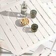 OVIALA - Ensemble table de terrasse 70cm et 2 chaises blanc - Almada - vignette