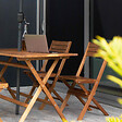 OVIALA - Table de terrasse pliante en bois d'eucalyptus - Sete - vignette