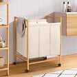 ID MARKET - Panier à linge 3 compartiments bambou RITA tissu écru avec roulettes - vignette