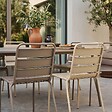 OVIALA - Ensemble table de jardin et 8 chaises en métal taupe et ivoire  - Palavas - vignette